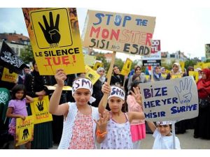 Belçika'da binlerce kişi katliamları protesto etti