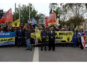 Mursi'nin yargılanmasını protesto ettiler